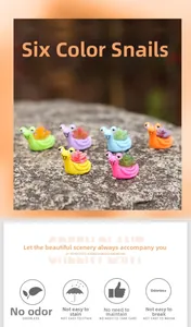 Close-up of six colorful resin snail planters with realistic miniature succulent plants