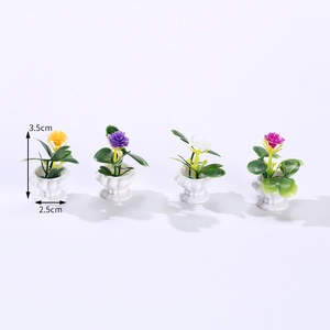 Vierer-Set Miniatur-Puppenhaus-Topfpflanzen mit bunten Blumen und gewellten Töpfen