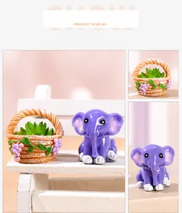 Detailed view of miniature resin purple elephant and succulent plant for DIY micro landscapes