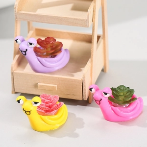 Three cute resin snail figurines with artificial succulents for moss micro-landscapes