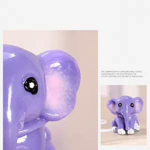 Close-up of a purple resin elephant figurine with a glossy finish for home garden DIY