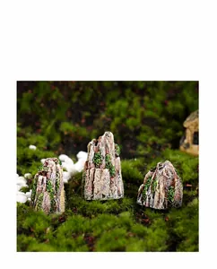 Detailed view of miniature rockery set with realistic texture and moss for fish tanks