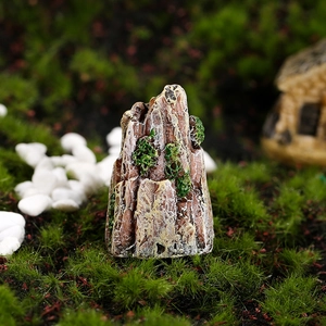 Miniature rockery stone with green moss for aquarium garden and bonsai decoration