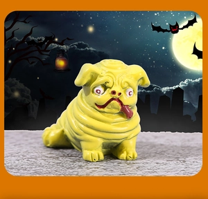 Detailed resin Halloween pug figurine with spooky yellow texture and creepy eyes