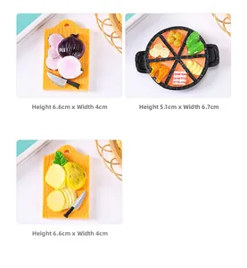 Detailed view of resin refrigerator magnets featuring realistic vegetable and hotpot designs