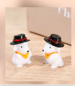 Miniature resin puppy figurine with black top hat and yellow scarf for DIY bonsai decor