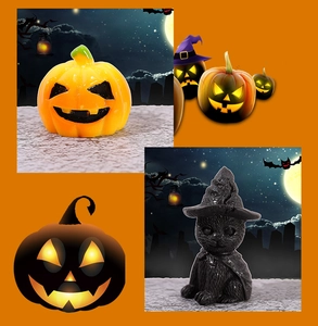 Close-up of resin Jack-o'-lantern and black cat witch ornaments for Halloween decor