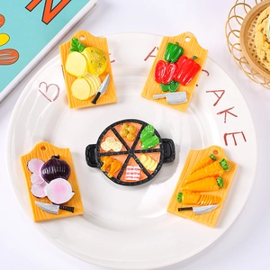 Five-piece resin refrigerator magnets set featuring realistic vegetable boards and pan