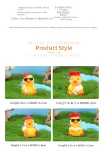 Detail view of mini resin duck figurines with graduation caps for home desk decoration