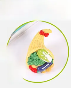 Macro shot of colorful resin miniature vegetable set including corn and broccoli textures