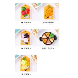Creative resin food refrigerator magnets featuring miniature vegetables and breakfast pans