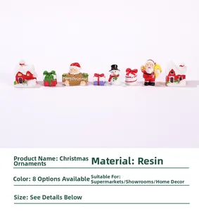 Set of 8 miniature resin Christmas figurines featuring Santa, snowmen, and gift boxes