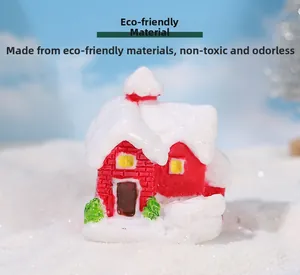 Detailed view of eco-friendly snow-covered cabin miniature for Christmas DIY crafts