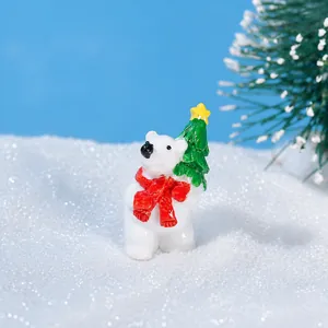 Detailed Christmas polar bear resin figurine wearing a red scarf in a snowy scene