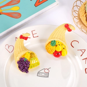 Resin fruit cornucopia miniature with colorful grapes and pineapple for home decor