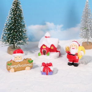 Miniature Christmas resin figurine set with Santa Claus and winter snow scene decor
