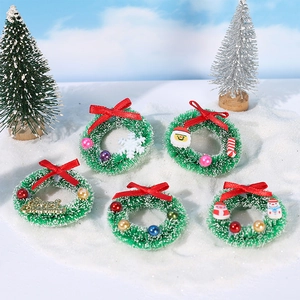 Set de 5 mini coronas navideñas con figuras de Papá Noel y muñeco de nieve en resina
