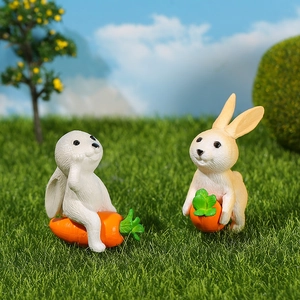 Miniature resin rabbit figurines on a carrot, cute garden landscape decor set