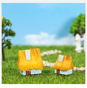 Détail de maisons miniatures en résine pour décor de bonsaï et jardin féerique
