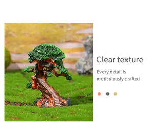 Detailed view of miniature tree house with mossy green texture and carved stairs
