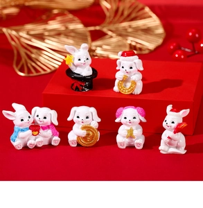 Set of 6 mini resin rabbit and dog figurines with festive red hats and gold stars