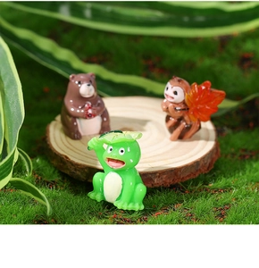 Three-piece forest animal resin figurines featuring a frog with lotus leaf and a bear