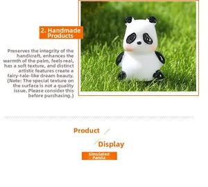 Detailopname van een handgemaakt miniatuur panda-harsbeeldje op groen gras