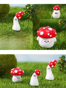 Macro shot of miniature resin mushrooms with cute faces for terrarium decor