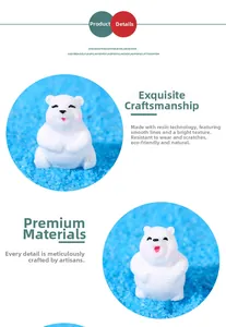 Detailed view of miniature resin polar bear figurines with hand-painted facial details