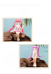 Detailed view of miniature cartoon girl figurines in pink and white dresses for DIY decor
