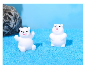 Detailed view of two mini resin polar bear figurines for micro landscape decoration