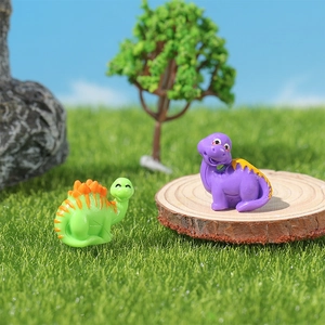 Miniatuur dinosaurusbeeldjes van hars met lichtgroene stegosaurus en paarse brontosaurus