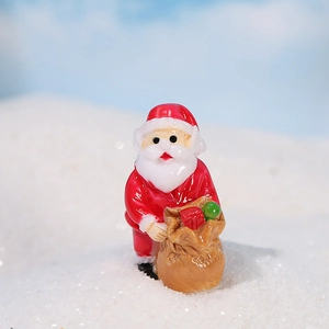Miniatur Weihnachtsmann-Figur aus Harz mit Geschenksack auf Schnee für Landschaften