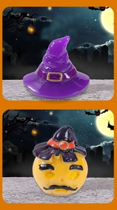 Detailed view of Halloween resin ornaments featuring purple witch hat and bearded pumpkin head