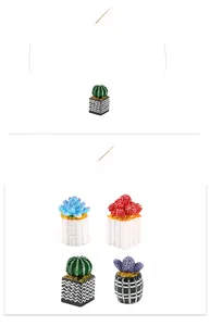 Miniature dollhouse succulent plants with stylish patterned pots in four unique designs