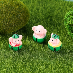 Three cute pink resin pig miniatures in watermelon bases for miniature garden decor