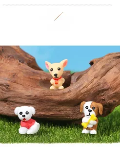 Detailed close-up of three miniature resin puppy figurines on natural moss decor