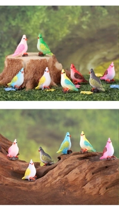 Macro detail of colorful miniature resin birds with realistic feather textures and wood stands