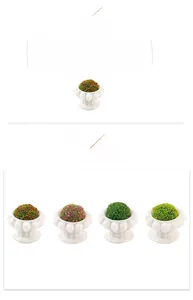 Macro detail of miniature artificial potted plants with colorful textured green spheres