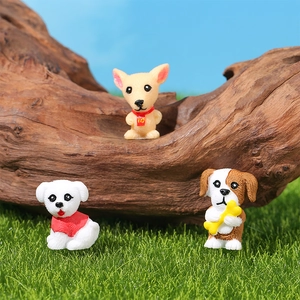 Three cute resin puppy figurines in a micro landscape setting with grass and wood decor