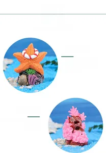 Detail of colorful resin starfish and coral figurines for aquarium fish tank decoration