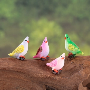 Set of four colorful miniature resin birds on wood stakes for micro landscape decor