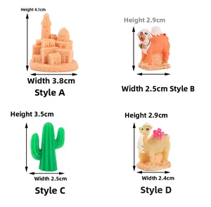 Miniature resin desert set featuring a sandcastle, camel, cactus, and llama figurines
