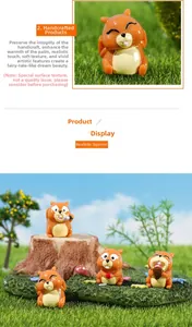 Close-up of squirrel resin figurines in miniature landscape with creative handicraft details