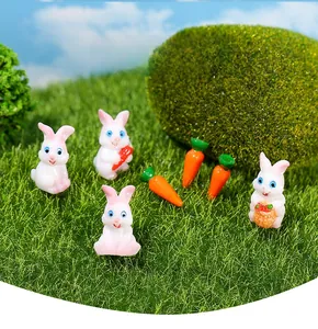 Miniature resin rabbit set for succulent plants featuring tiny bunnies and carrots