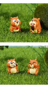 Detail view of four cute resin squirrel figurines for micro landscape bonsai decoration