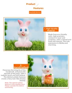 Close-up of resin rabbit miniature with a carrot in a garden micro landscape