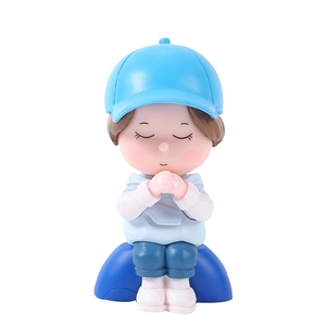 Cute wishing doll figurine in blue cap for desktop micro landscape decoration