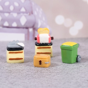 Miniature dollhouse furniture set including toaster, parcel box, and green recycling bin