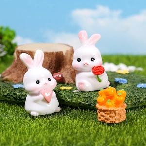 Miniature resin rabbit figurines with heart, rose, and carrot basket for garden decor